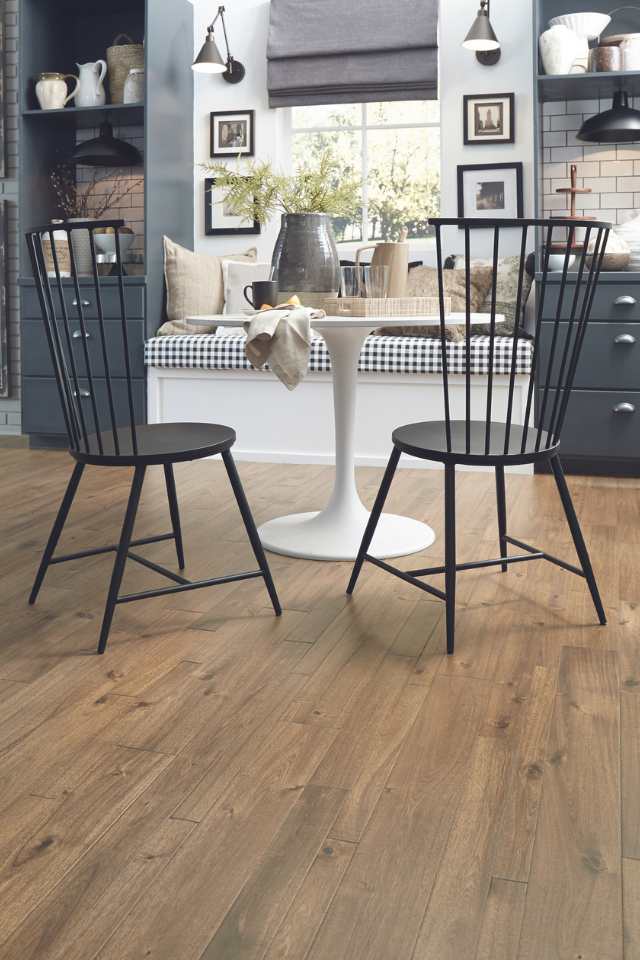 warm hardwood in farmhouse scandi style kitchen nook with greenery